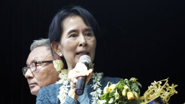 Aung San Suu Kyi speaking in Rangoon yesterday ... Anwar Ibrahim dismissed the idea that her release is a step towards full democracy.