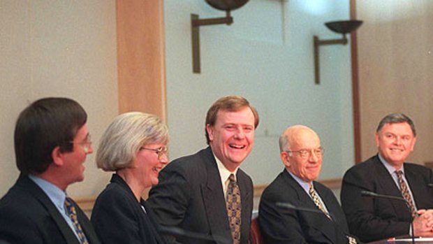 Then treasurer Peter Costello (centre) with members of the Wallis inquiry at Parliament House in 1996.
