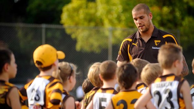 No jibes here . . . Lance Franklin visits a school yesterday.