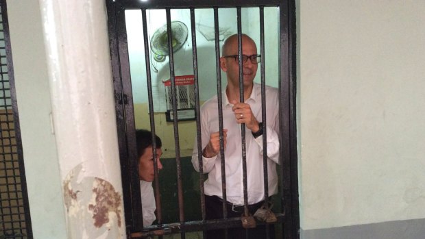 Indonesian teacher's aide Ferdinant Tjiong and Canadian teacher Neil Bantleman.