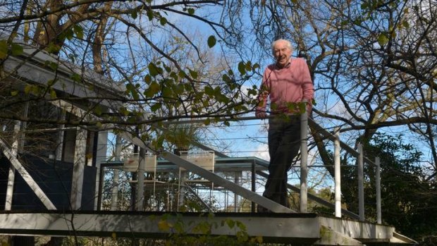 McIntyre on the cantilevered balcony of River House in Kew.