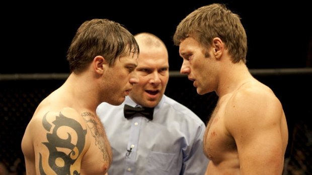 Tom Hardy and Joel Edgerton as brothers Tommy and Brendan face off in <i>Warrior</i>