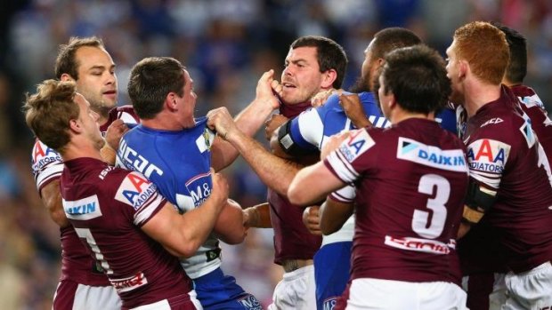 Disagreement: Josh Jackson and Josh Starling square up after an apparent chicken wing tackle by Jackson on the manly forward.