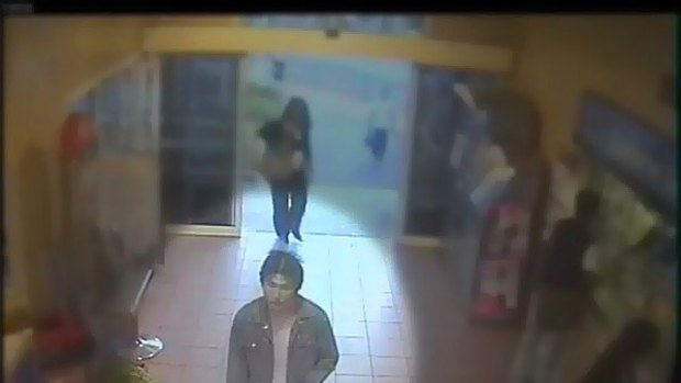 Security footage shows Haiming Chen, the man police wish to speak to in relation to the murder at Clayton Railway station.