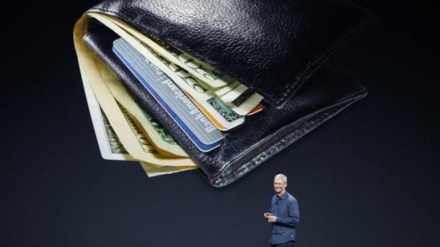 IPay, you pay, we all pay: Apple boss Tim Cook presenting the "tap and go"  payment features of the new iPhone. The service, once introduced to Australia, could prove a breakthrough for digital wallets.