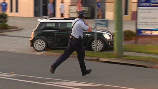 The car is driven on to the footpath on the Gold Coast.