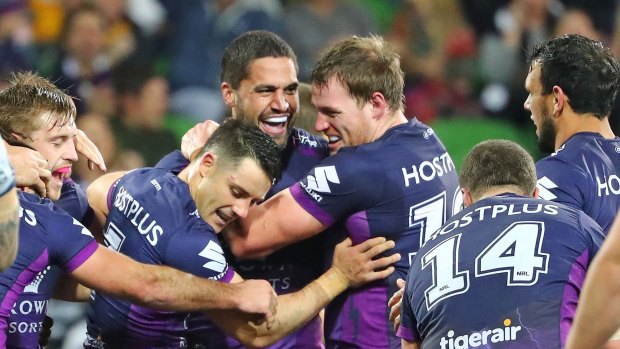 Jesse Bromwich is congratulated by teammates after scoring in the qualifying final against the Cowboys last year.