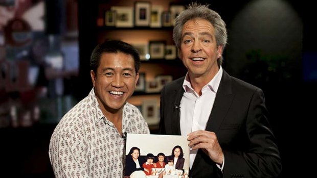 Frozen moment &#8230; comedian Ahn Do shares a childhood photo with host Brian Nankervis on <em>Pictures of You</em>.