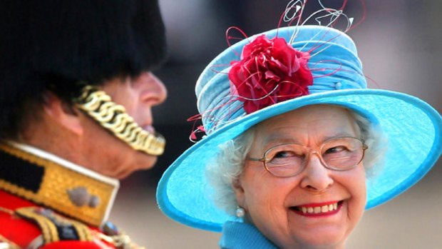 Queen Elizabeth II smiles at Prince Philip during the annual Trooping of the Colour parade.