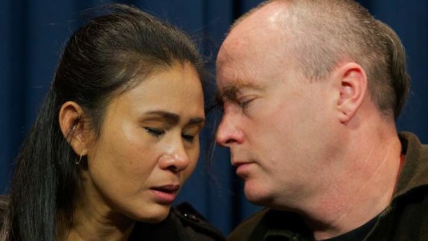 The missing schoolgirl's mother, Vanidda Siriyakorn, and step-father, Fred Pattison.