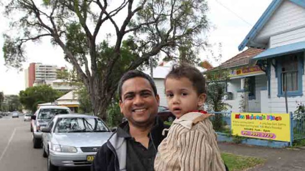 Rajesh Mudlapur with his son Sumedh, 2.