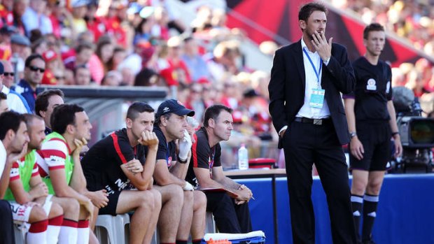 Character building: Tony Popovic looks pensive on the sidelines during the Wanderers' 1-0 loss to Adelaide at Coopers Stadium.