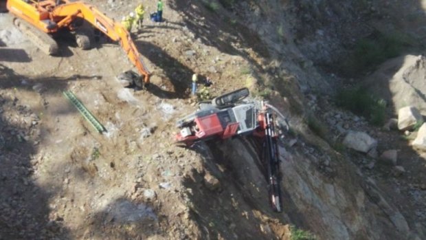 A driver was trapped in the 20-tone excavator.