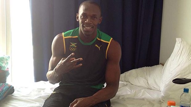 Bolt later posted another picture of himself sitting on his unmade bed and holding up three fingers.