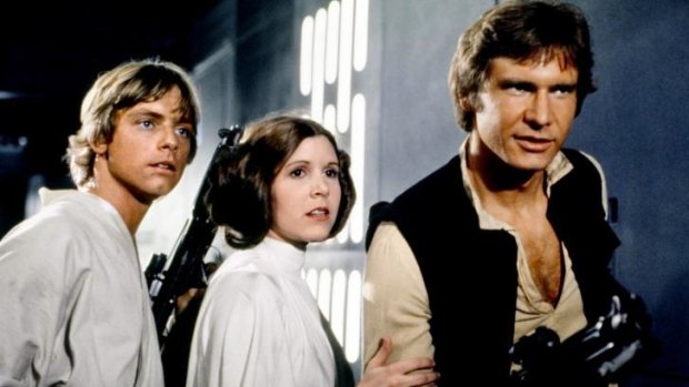 A still from the original Star Wars (1977) movie. Luke Skywalker (Mark Hamill),   Princess Leia (Carrie Fisher) and Han Solo (Harrison Ford) all return for The Force Awakens. 