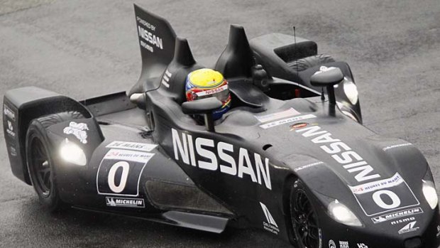 Michael Krumm of Germany drives his Nissan Delta Wing during a warm-up session before the Le Mans 24-hour race in Le Mans.