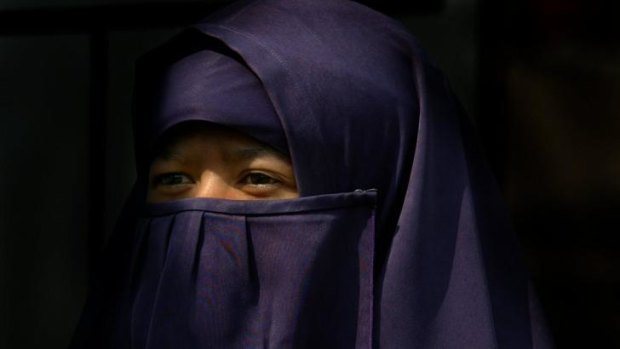 A veiled woman, labelled "a non-issue" by Bilal Rauf of the Muslim Lawyers Network.