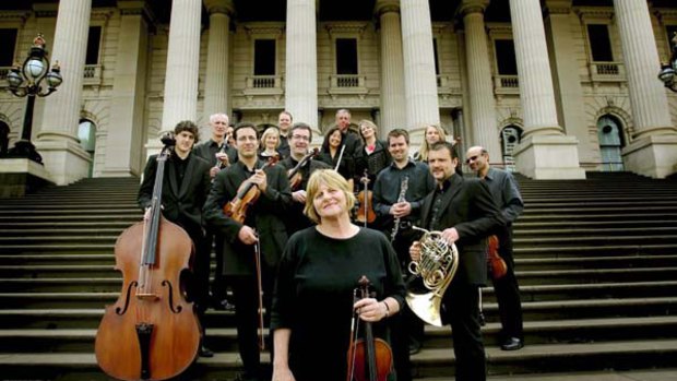 Orchestra Victoria's artistic director, Jo Beaumont (centre), and her orchestra. <i>Picture: John Woudstra</i>
