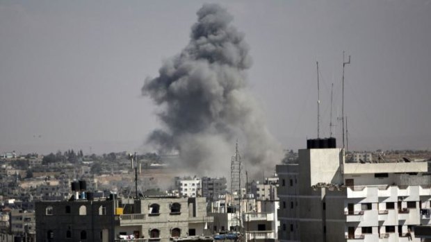Smoke rises following an Israeli strike in Rafah.