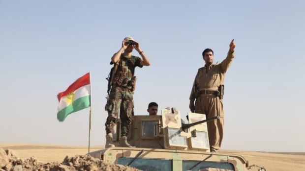 Kurdish peshmerga troops fight back against Islamic State militants.