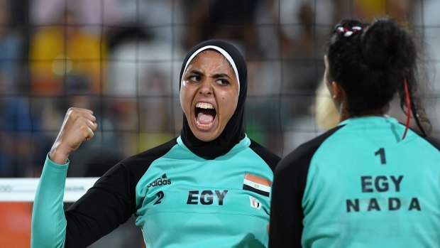 Doaa Elghobashy, of Egypt, celebrates during the women's beach volleyball pool match against Germany.