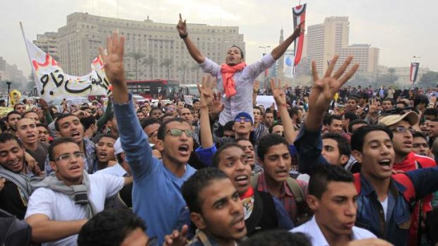 Pro-Mursi university students and supporters of the Muslim Brotherhood occupy Tahrir Square for the first time since the removal of President Mohamed Mursi.