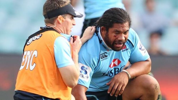Kamikaze: Tatafu Polota-Nau takes a breather after getting knocked out during the Waratahs' game against the Western Force at Allianz Stadium in March.