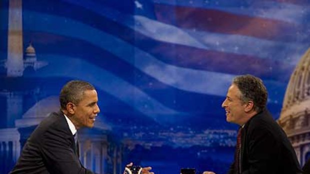 Barack Obama with Jon Stewart.
