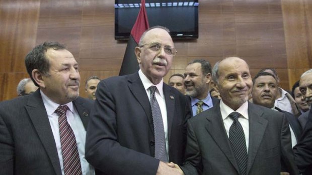 Newly elected Libyan Prime Minister Abdel Rahim al-Keeb intends to reign in the militias to restore order.