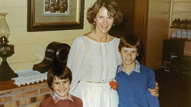 Down on the farm … Hall (left) with his brother, Avan, and mother, Jo, on her wedding day.