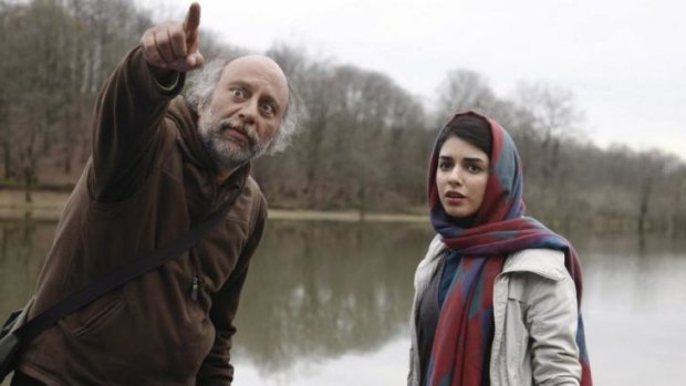Still from the film Fish & Cat ... Babak (Babak Karimi), talks Mina (Neda Jebraeeli) into coming with him into the forest.