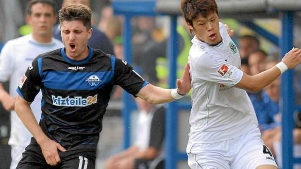 Miracle goalscorer: Paderborn's midfielder Moritz Stoppelkamp  (L).