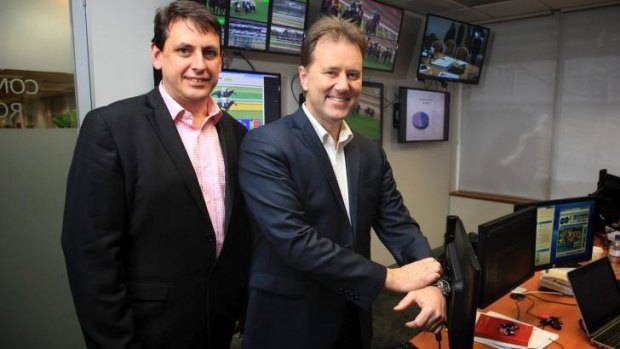 RVL chief steward Terry Bailey and head of integrity Dayle Brown in the  Racing Victoria integrity control room.