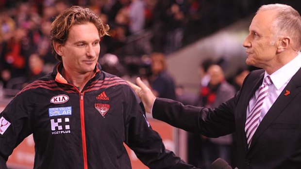 James Hird with Tim Watson before the game against Hawthorn on Saturday.