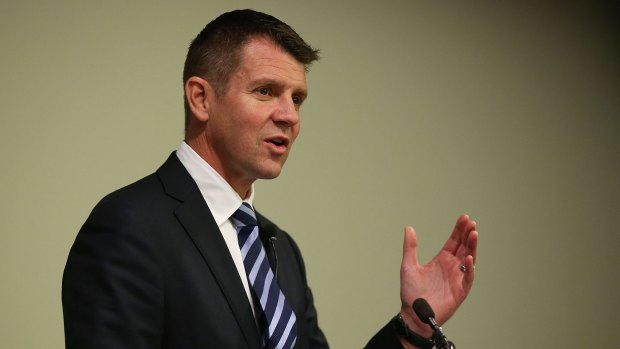 NSW Premier Mike Baird, who said that around $158 million will be given to Sydney councils and $100 million to regional councils that merge.
