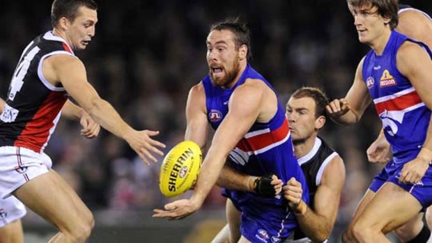 Western Bulldog ruckman Ben Hudson finds there is little room to play against St Kilda at Etihad Stadium last Friday night.