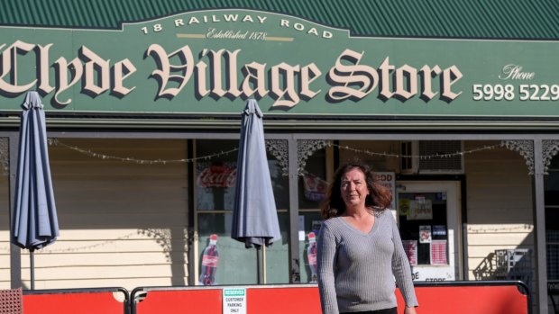 Tracey O'Brien, owner of the Clyde Village Store, fears the village's days as a bucolic oasis are numbered.