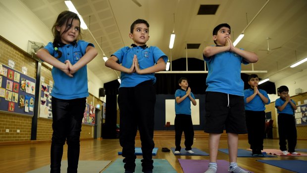 Refugee children at Liverpool West Public School are doing yoga classes to learn relaxation techniques.