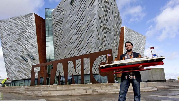Justin Lowry with his model outside Belfast's Titanic attraction.
