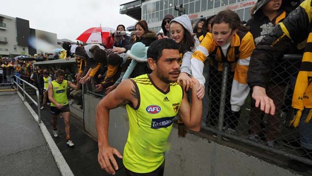 Hawthorn's Cyril Rioli comes out for training.