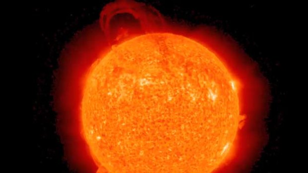 NASA says this image from a video shows an eruptive prominence blasting away from the sun.