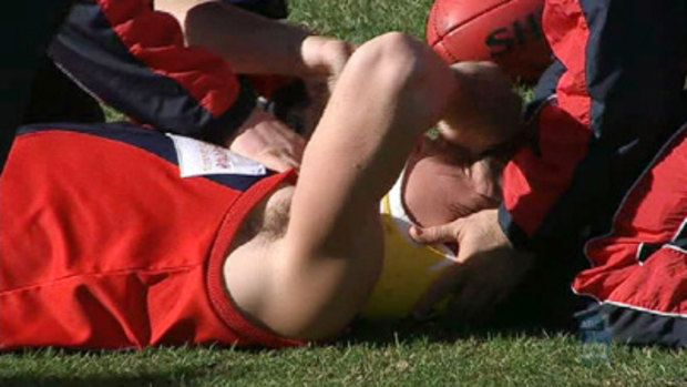 Graham Polak receives treatment after the collision.