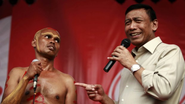 Chief Security Minister Wiranto (right) denied that the measure aimed to limit freedom of assembly.
