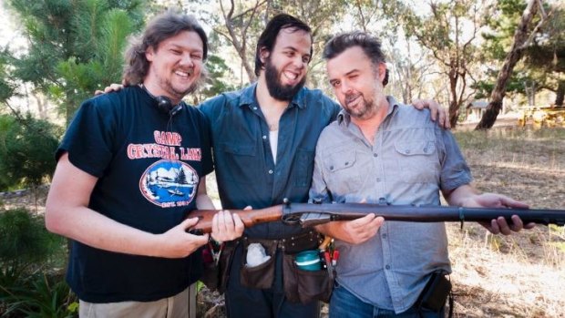 It's payback time: Cameron (left) and Colin (right) Cairnes, with Angus Sampson (centre) on the set of  <i>100 Bloody Acres</i>.