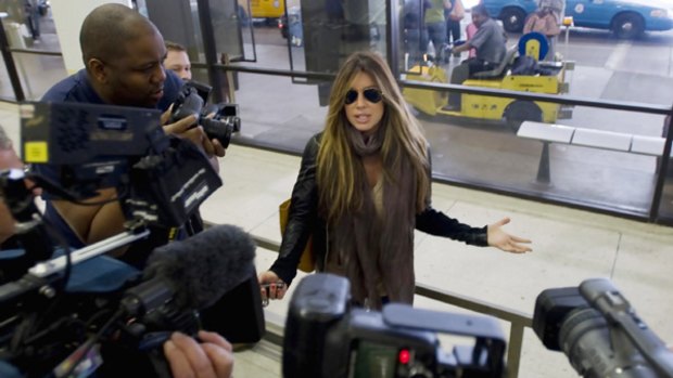 Rachel Uchitel speaks to the media at Los Angeles airport and denies having an affair with Tiger Woods.