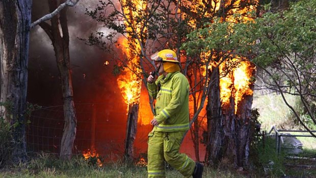 A firefighter at the bayside property.