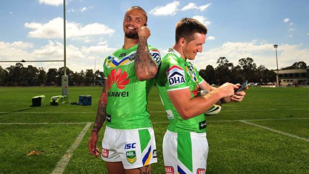 Raiders Sandor Earl and Josh McCrone with new Huawei mobile phones earlier this year.