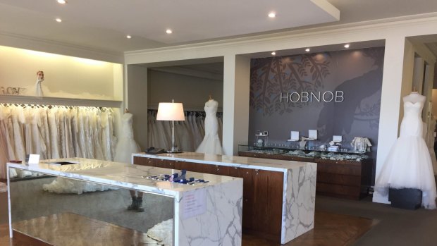 Hobnob Bridal in Highgate returned to business on Monday despite a fire gutting its rear office on Sunday night. 