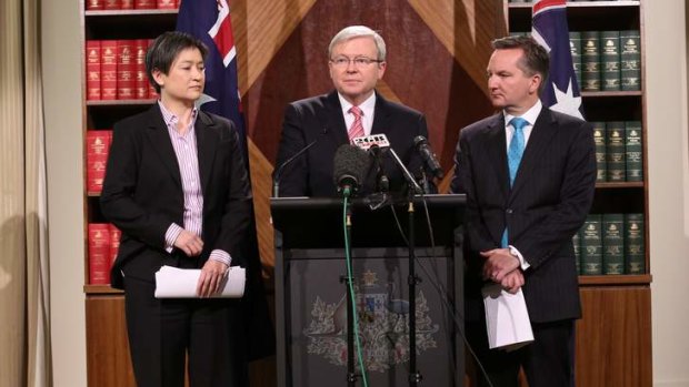 Prime Minister Kevin Rudd  with Senator Penny Wong and Treasurer Chris Bowen. Mr Bowen has not shared Mr Rudd's anxiety over foreign ownership of Australian land.