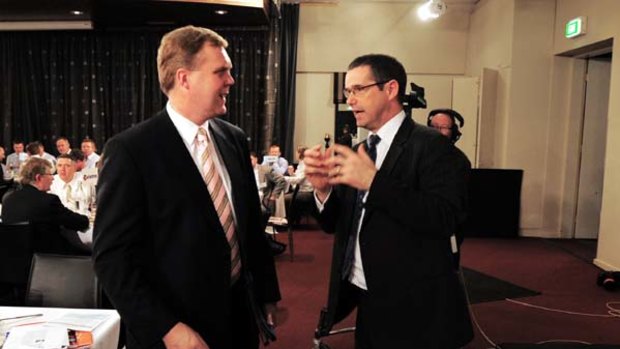 Gap . . . the shadow communication minister Tony Smith with Stephen Conroy at the National Press Club yesterday.